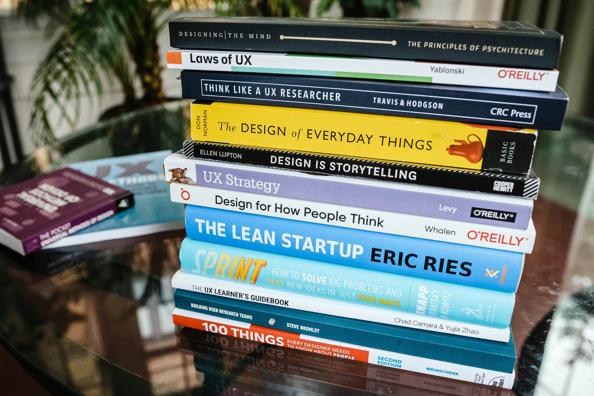 Stack of UX and design books