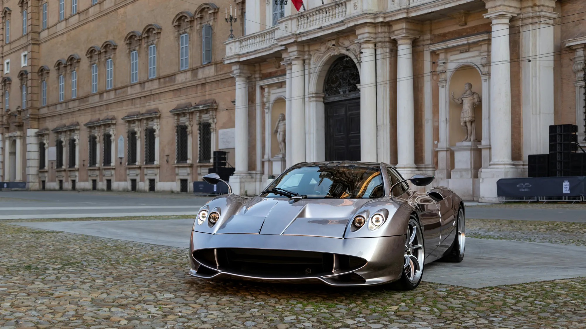 Silver Pagani in front of a palazzo